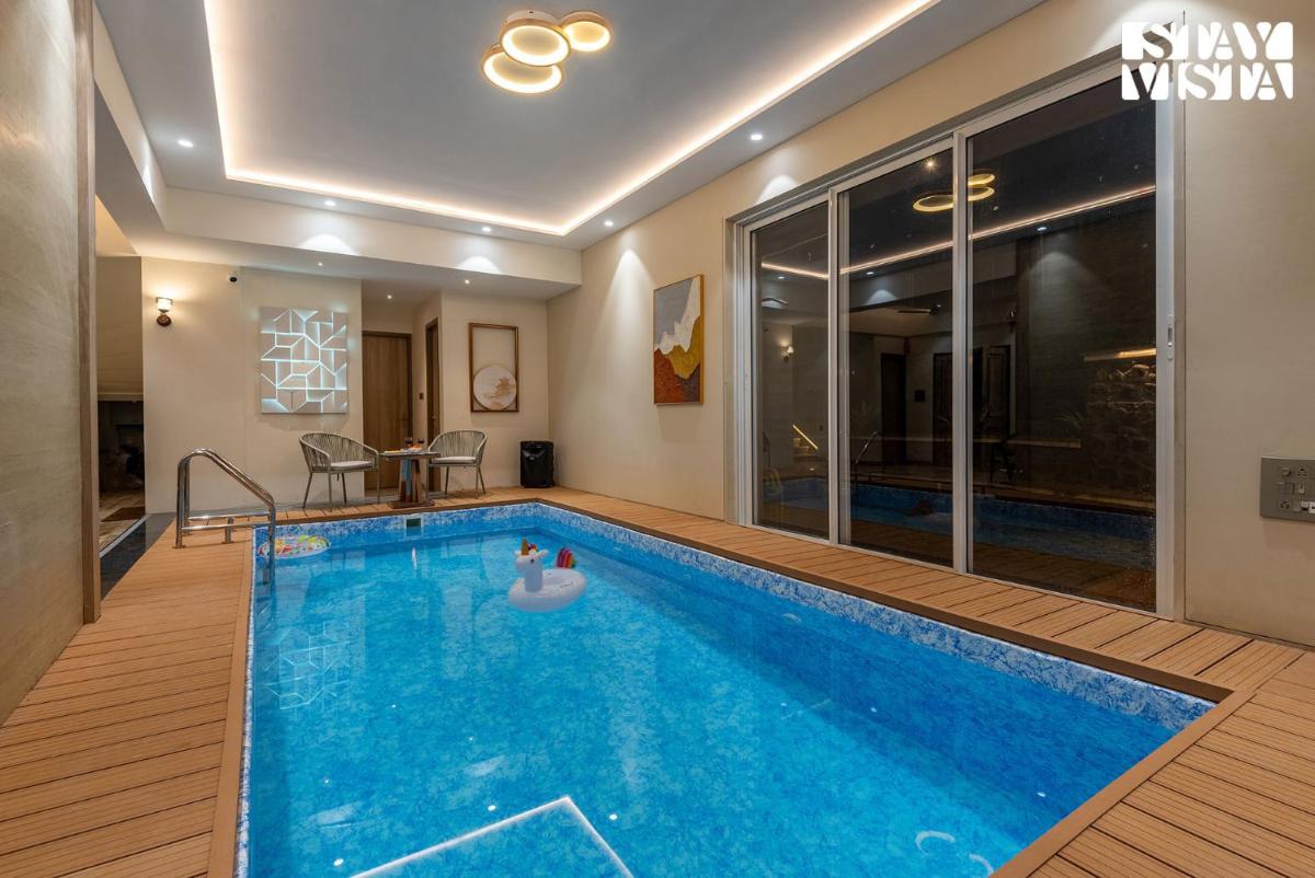 Mocha House with Indoor Pool, BBQ & Bonfire at Lonavala by StayVista - Housity