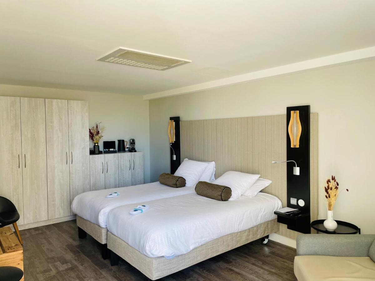 Un ou plusieurs lits dans un hébergement de l'établissement Thalazur Port-Camargue - Hotel & Spa