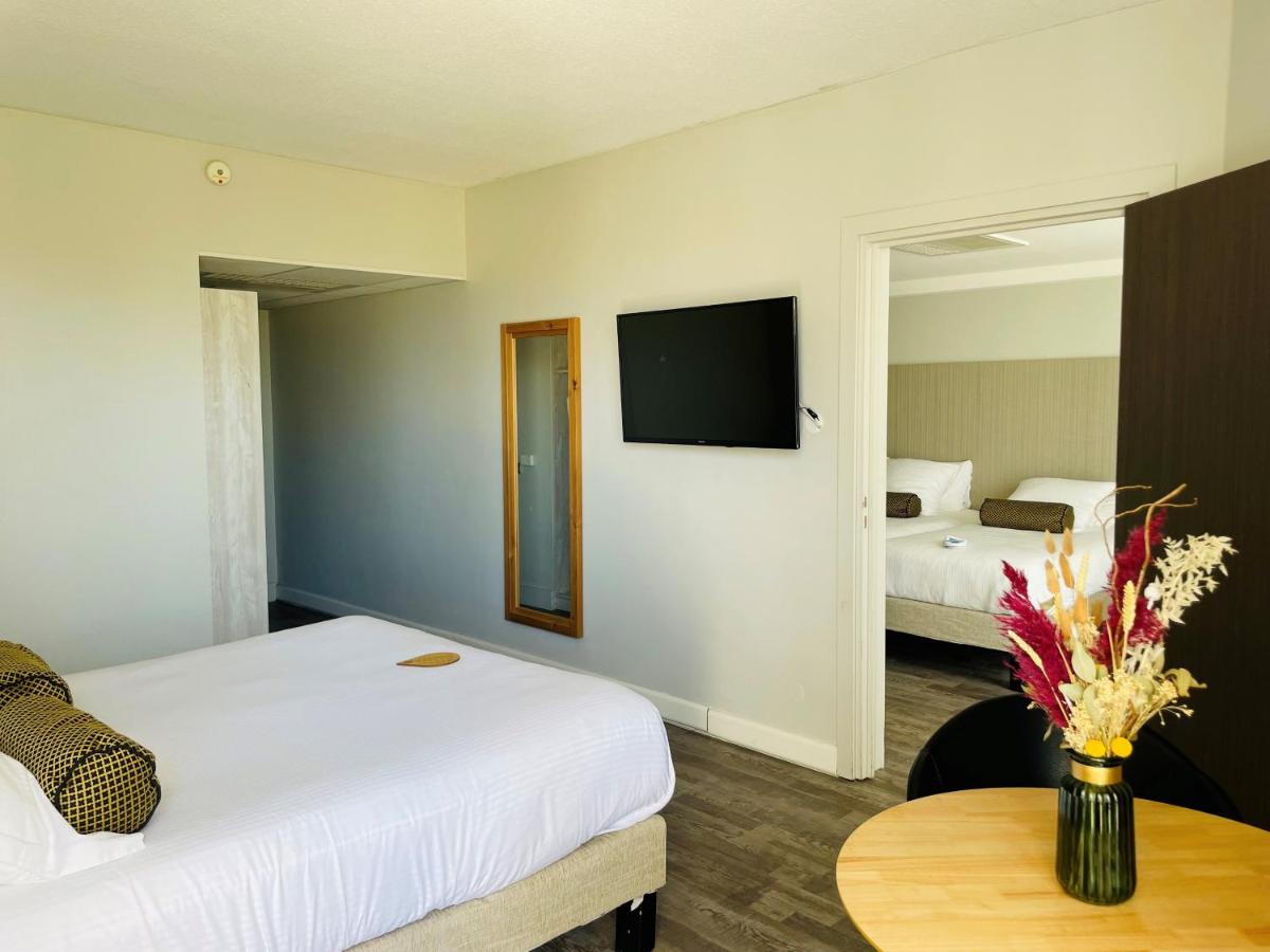 Un ou plusieurs lits dans un hébergement de l'établissement Thalazur Port-Camargue - Hotel & Spa