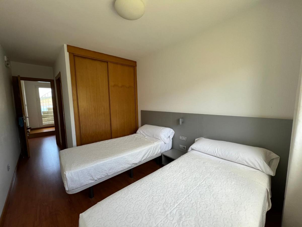 Cama o camas de una habitación en Porto Cabana by Miramar Stays