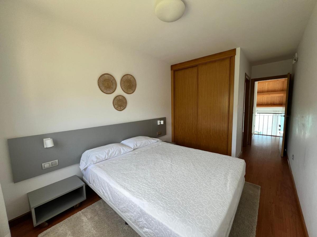 Cama o camas de una habitación en Porto Cabana by Miramar Stays