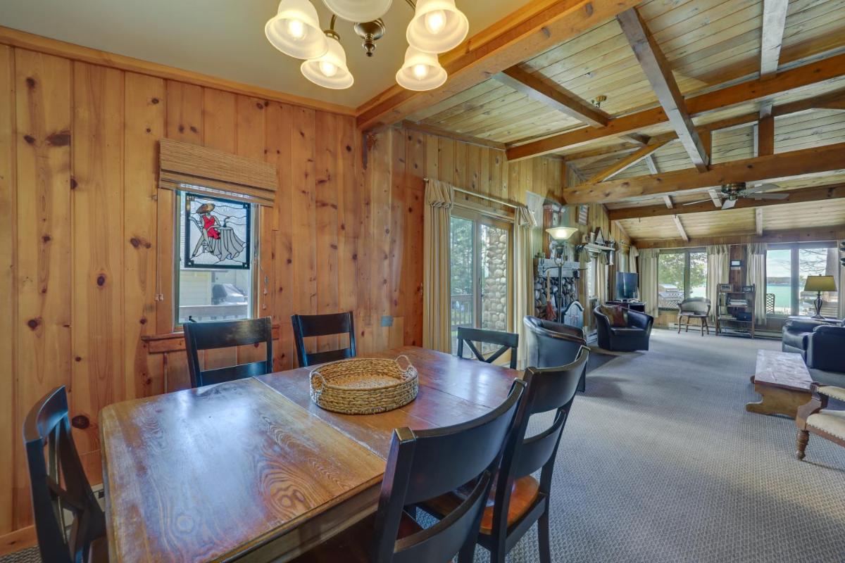 Waterfront Torch Lake Cottage with Private Beach! - Housity