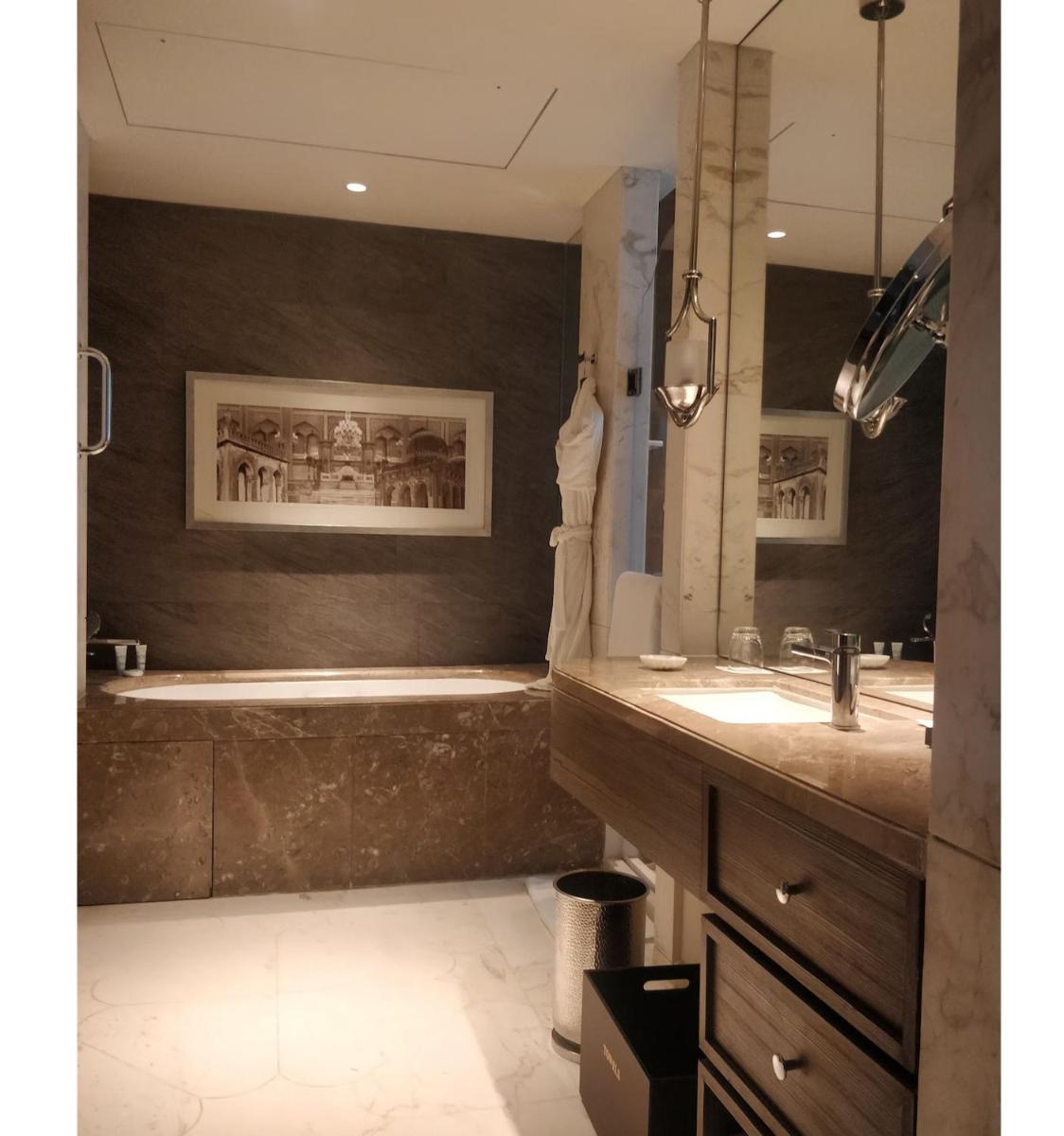 a bathroom with a tub and a sink at ITC Kohenur, a Luxury Collection Hotel, Hyderabad in Hyderabad