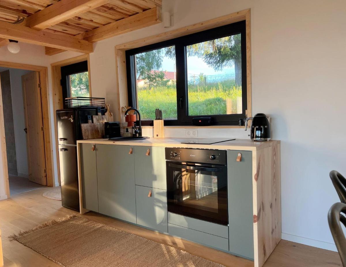 Forestia - Modern cabin with hot tub and sauna - Housity