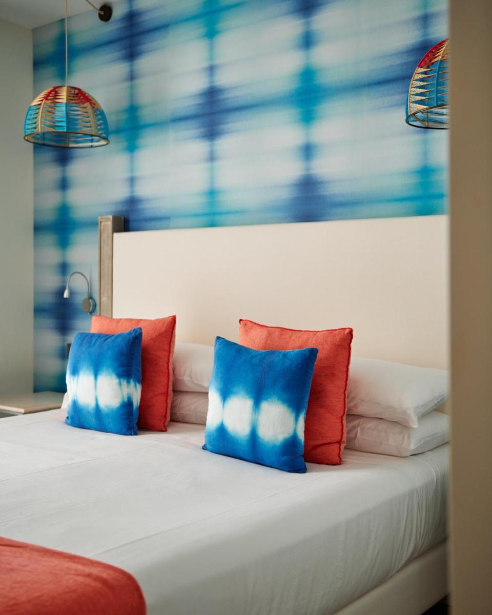 Cama o camas de una habitación en Hotel Honucai