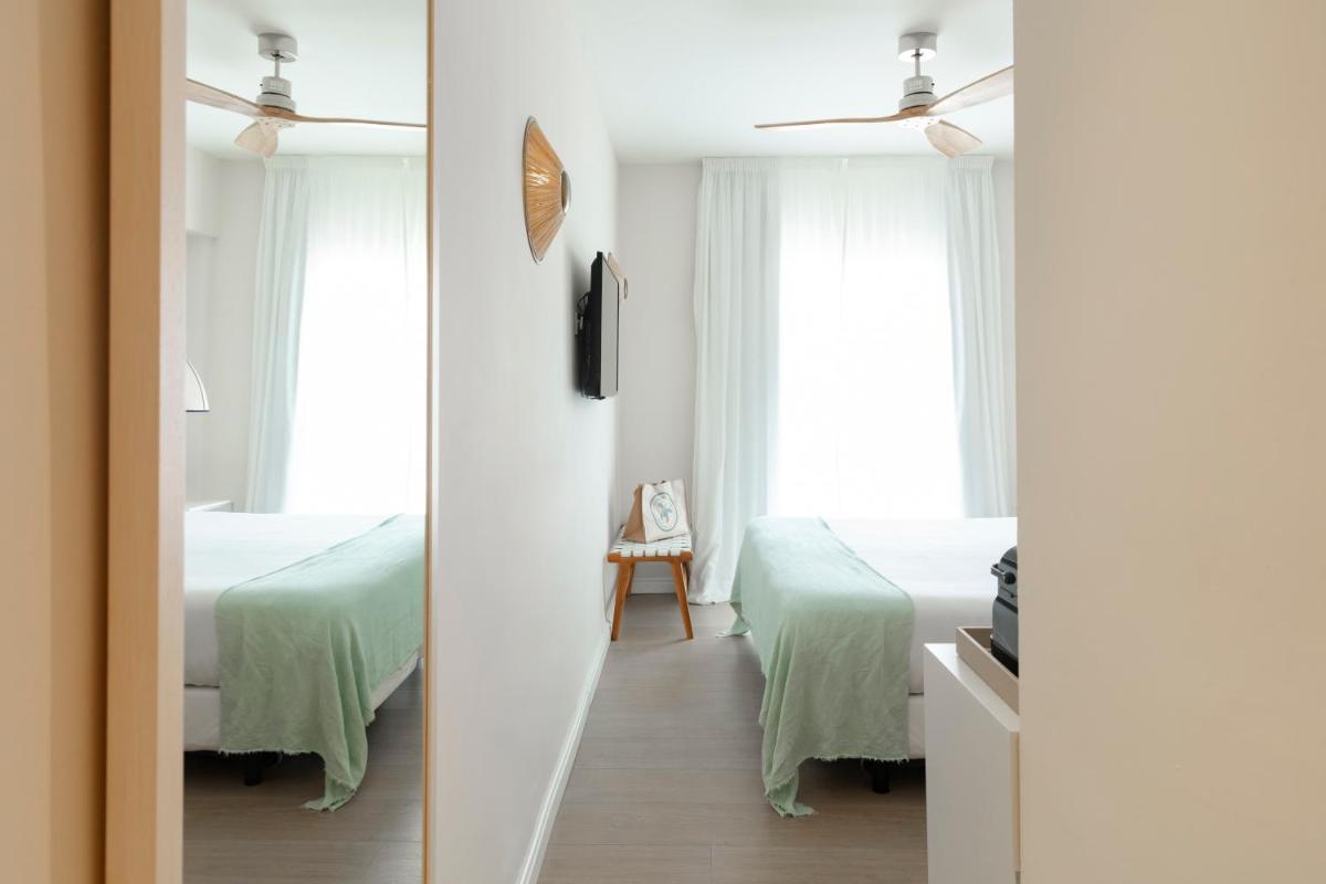 Cama o camas de una habitación en Hotel Honucai