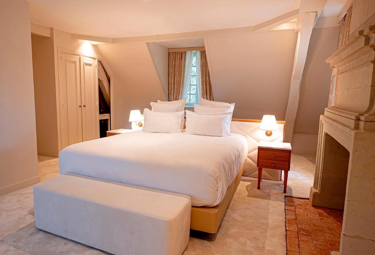 Un ou plusieurs lits dans un hébergement de l'établissement Château De Noirieux