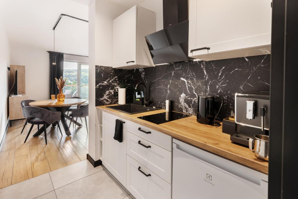 Apartamenty Larice - morsowanie w basenie, balia i sauna - Housity