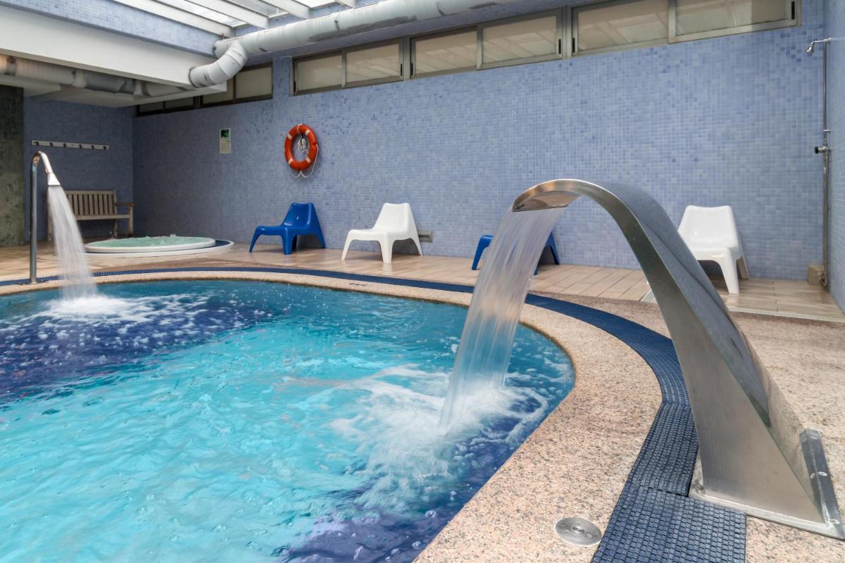 Piscina en o cerca de Hotel Milagros Golf