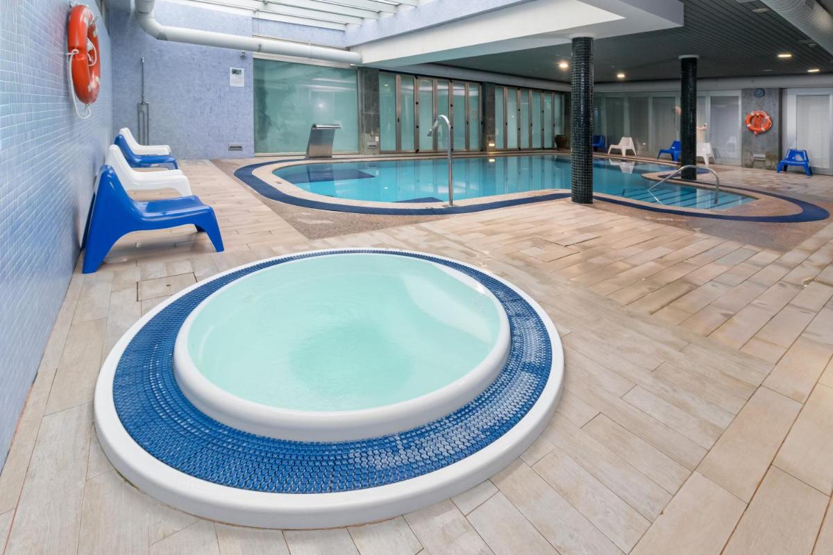 Piscina en o cerca de Hotel Milagros Golf