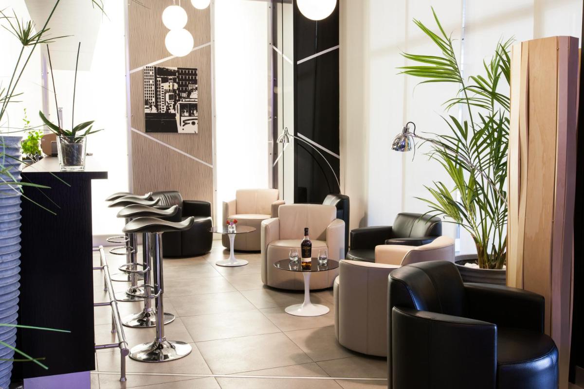 Coin salon dans l'établissement Hôtel Point France
