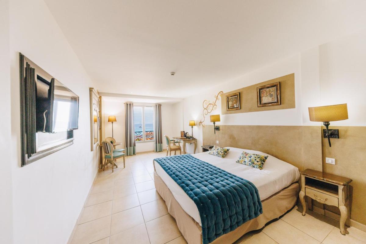 Un ou plusieurs lits dans un hébergement de l'établissement Hôtel Liberata & Spa