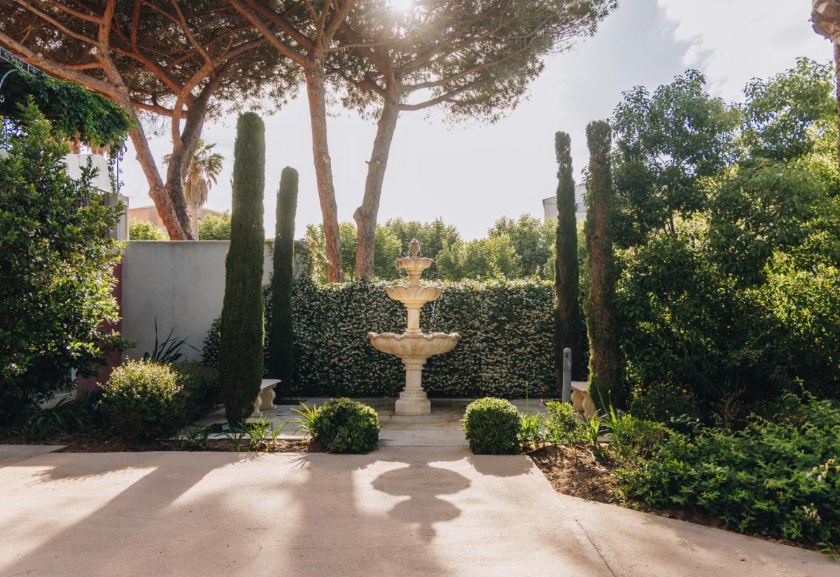 Jardin de l'établissement Hôtel Liberata & Spa
