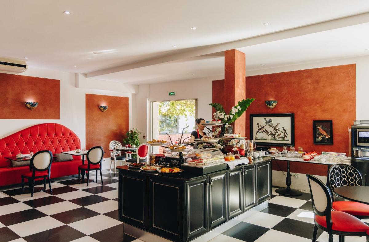 Coin salon dans l'établissement Hôtel Liberata & Spa