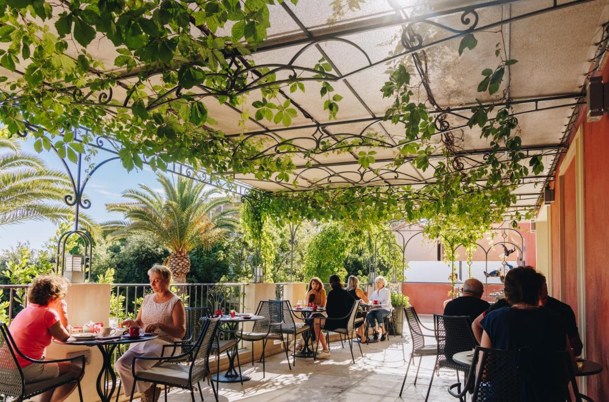 Restaurant ou autre lieu de restauration dans l'établissement Hôtel Liberata & Spa