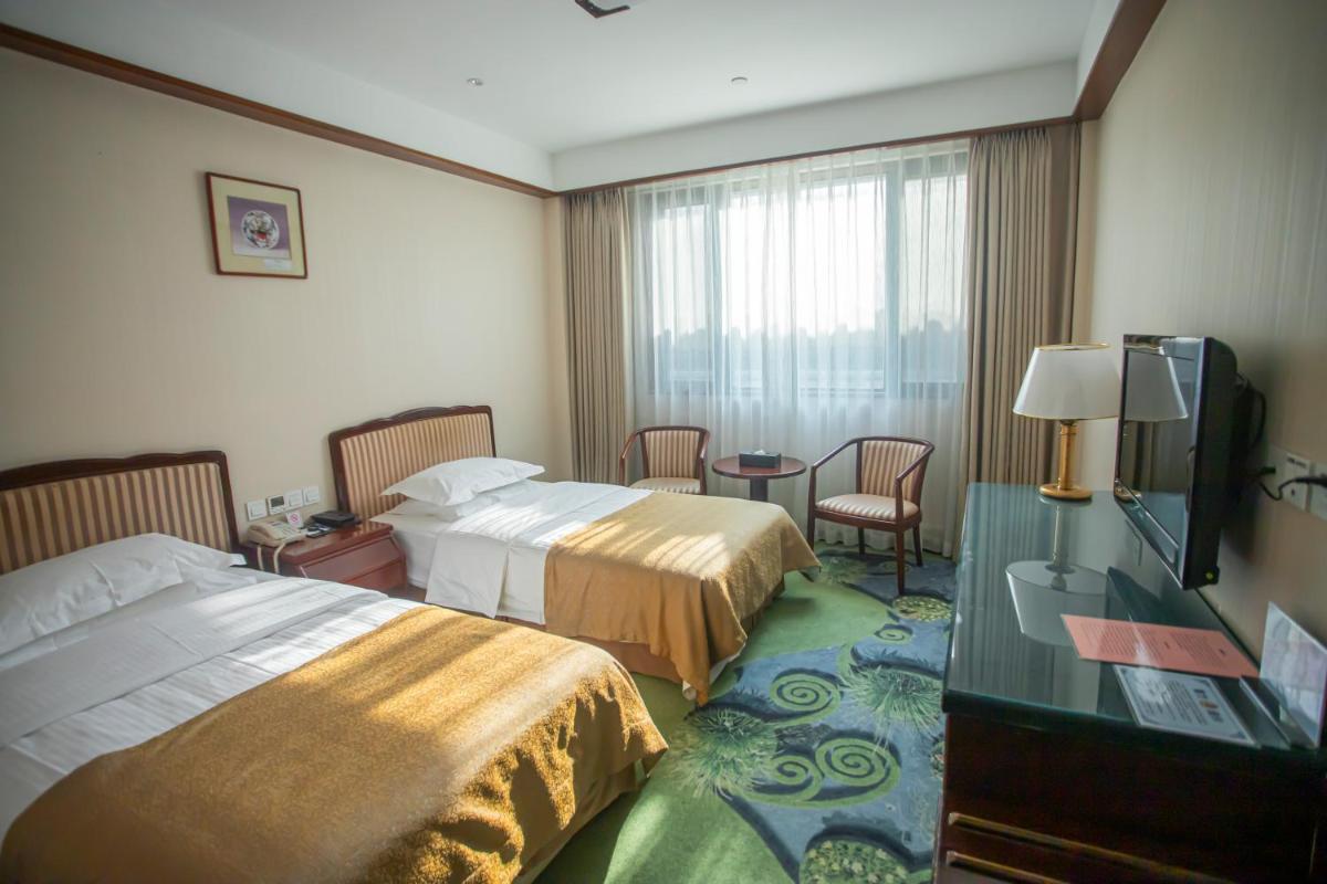 Jade Garden Hotel - Housity
