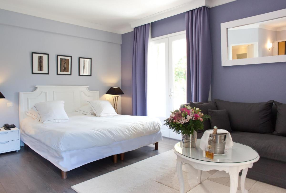 Un ou plusieurs lits dans un hébergement de l'établissement Le Vallon de Valrugues Hotel Spa & Villas