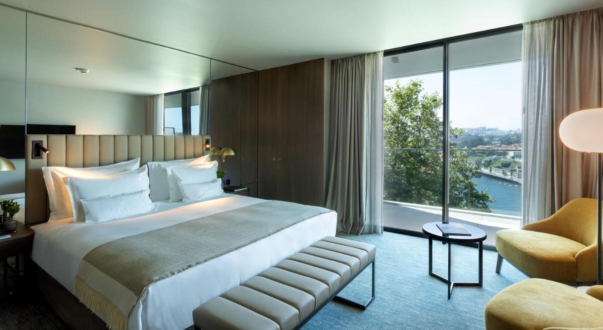 Uma cama ou camas num quarto em Altis Porto Hotel