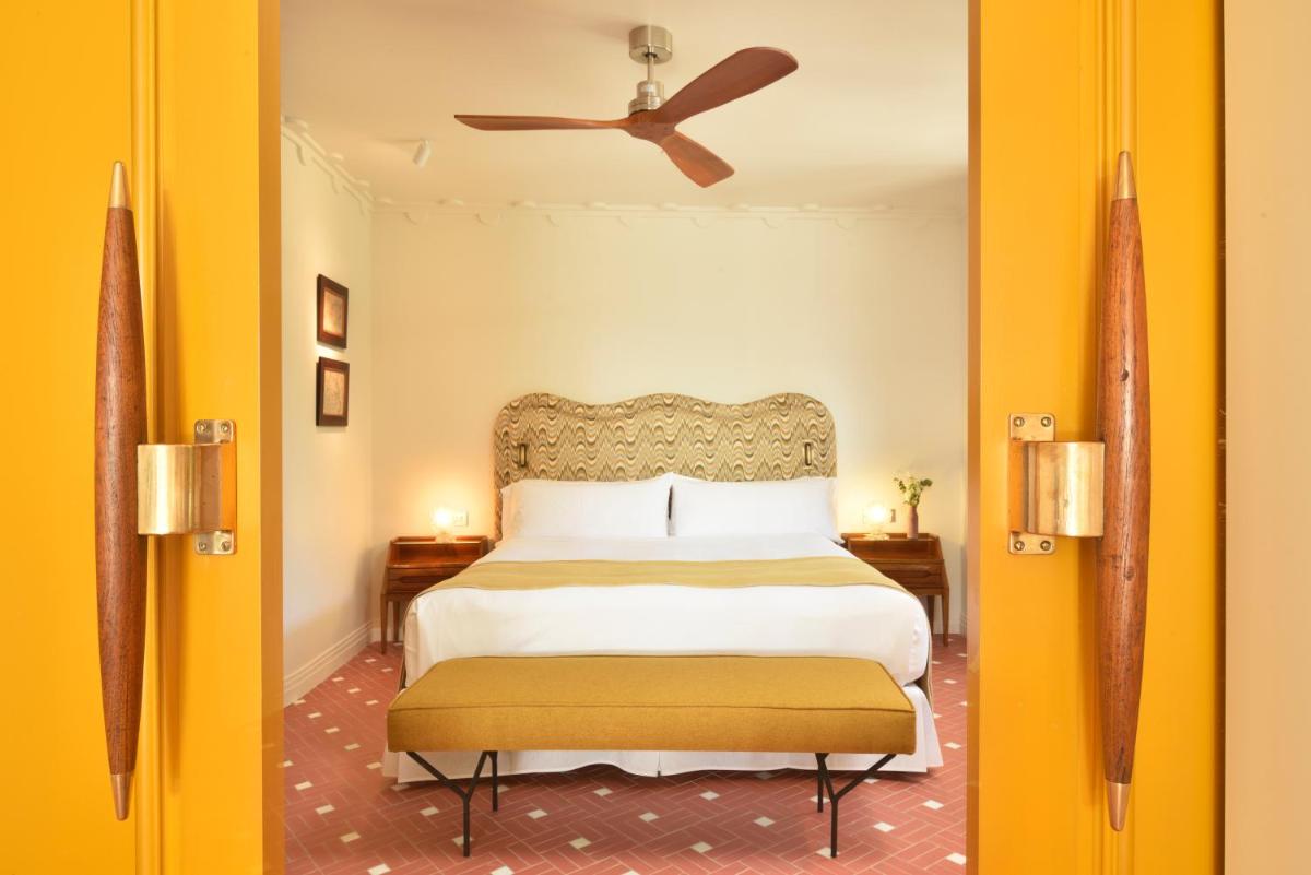 Cama o camas de una habitación en Hostal de la Gavina GL - The Leading Hotels of the World