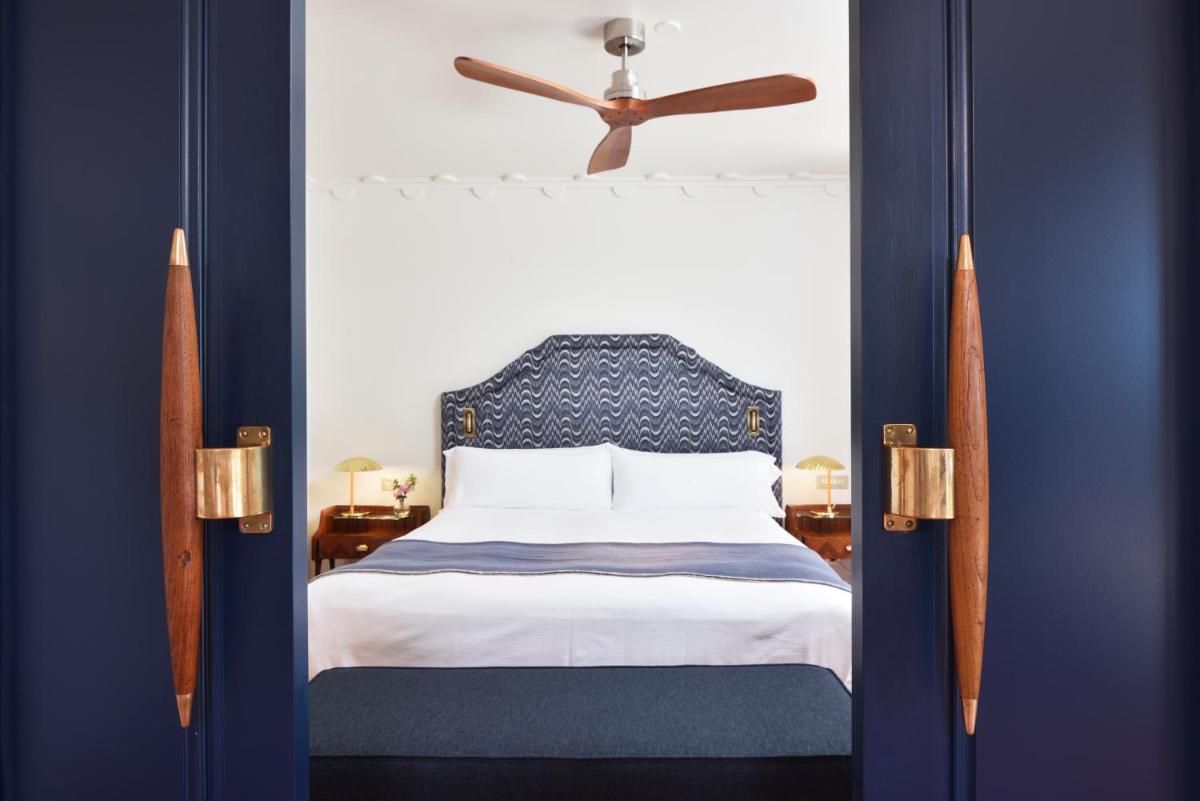 Cama o camas de una habitación en Hostal de la Gavina GL - The Leading Hotels of the World