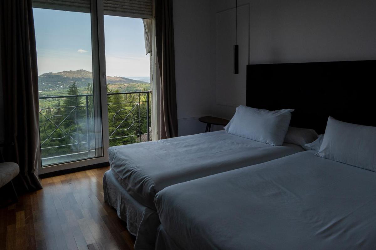 Cama o camas de una habitación en Hotel Hita "Nature Experience" for all