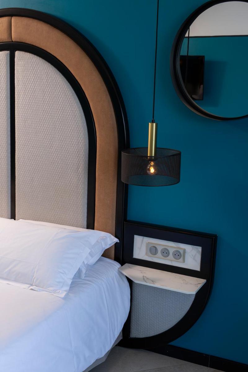 Un ou plusieurs lits dans un hébergement de l'établissement Hotel La Pietra Restaurant & Spa