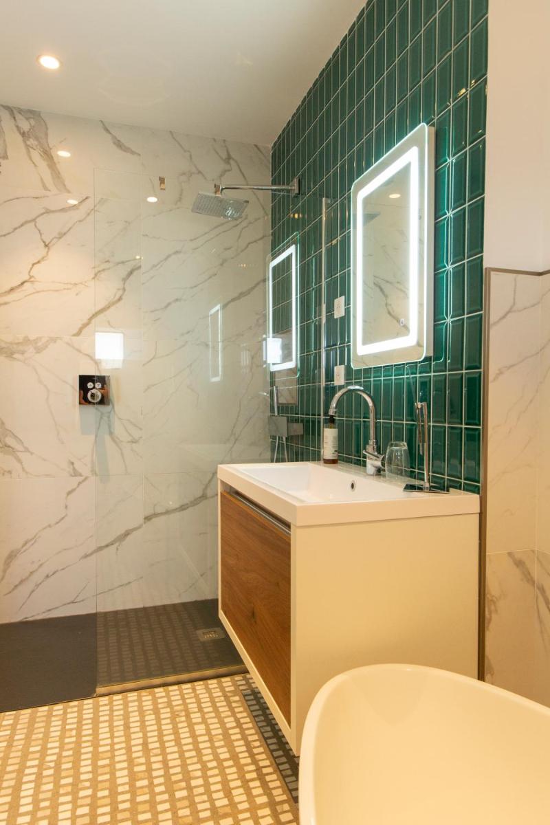 Salle de bains dans l'établissement Hotel La Pietra Restaurant & Spa