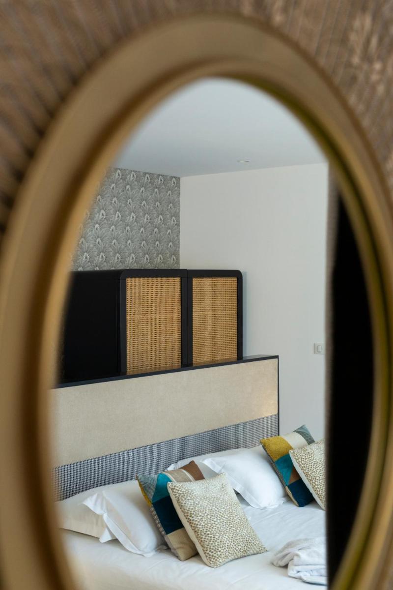 Un ou plusieurs lits dans un hébergement de l'établissement Hotel La Pietra Restaurant & Spa