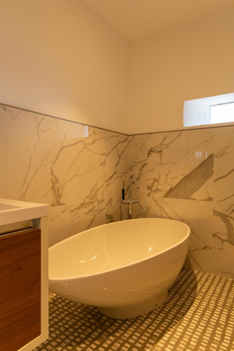 Salle de bains dans l'établissement Hotel La Pietra Restaurant & Spa