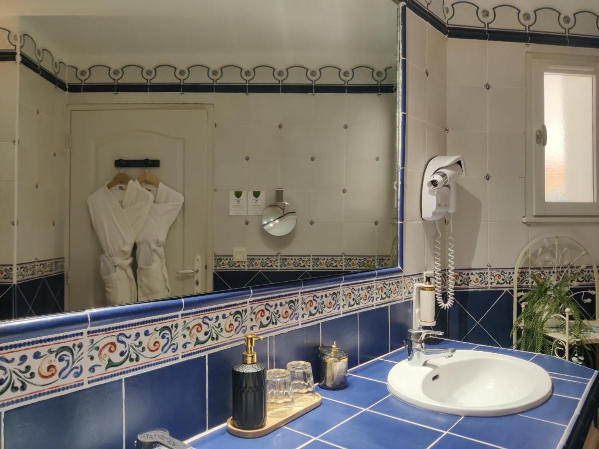 Salle de bains dans l'établissement Le Roc E Fiori Hotel - Teritoria
