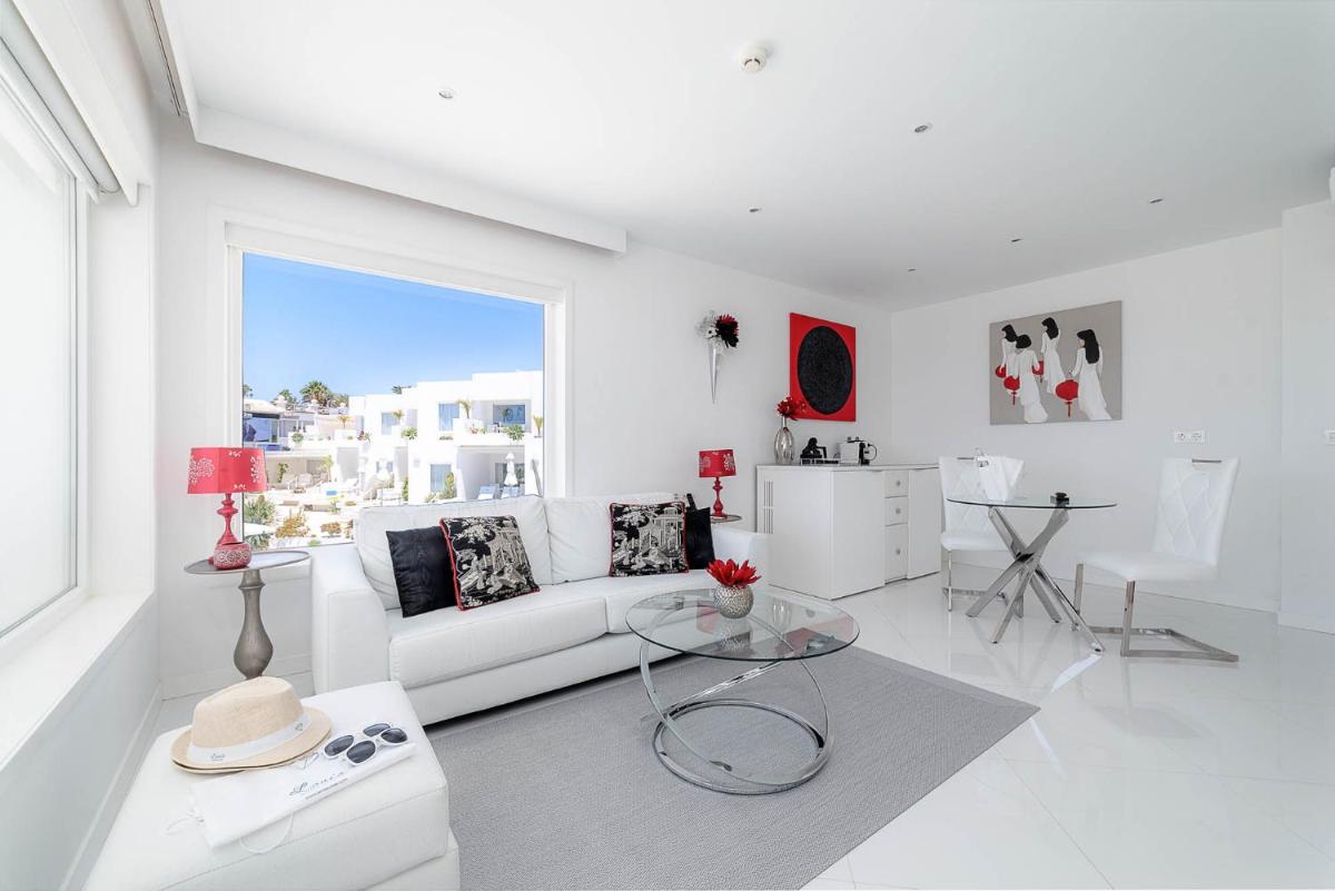 Zona de estar de Lani's Suites de Luxe - Adults Only