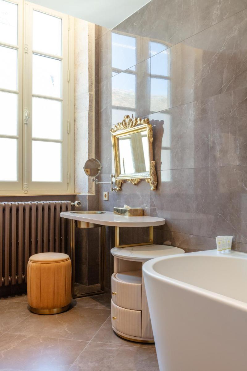 Salle de bains dans l'établissement Hôtel Le Cep & Spa