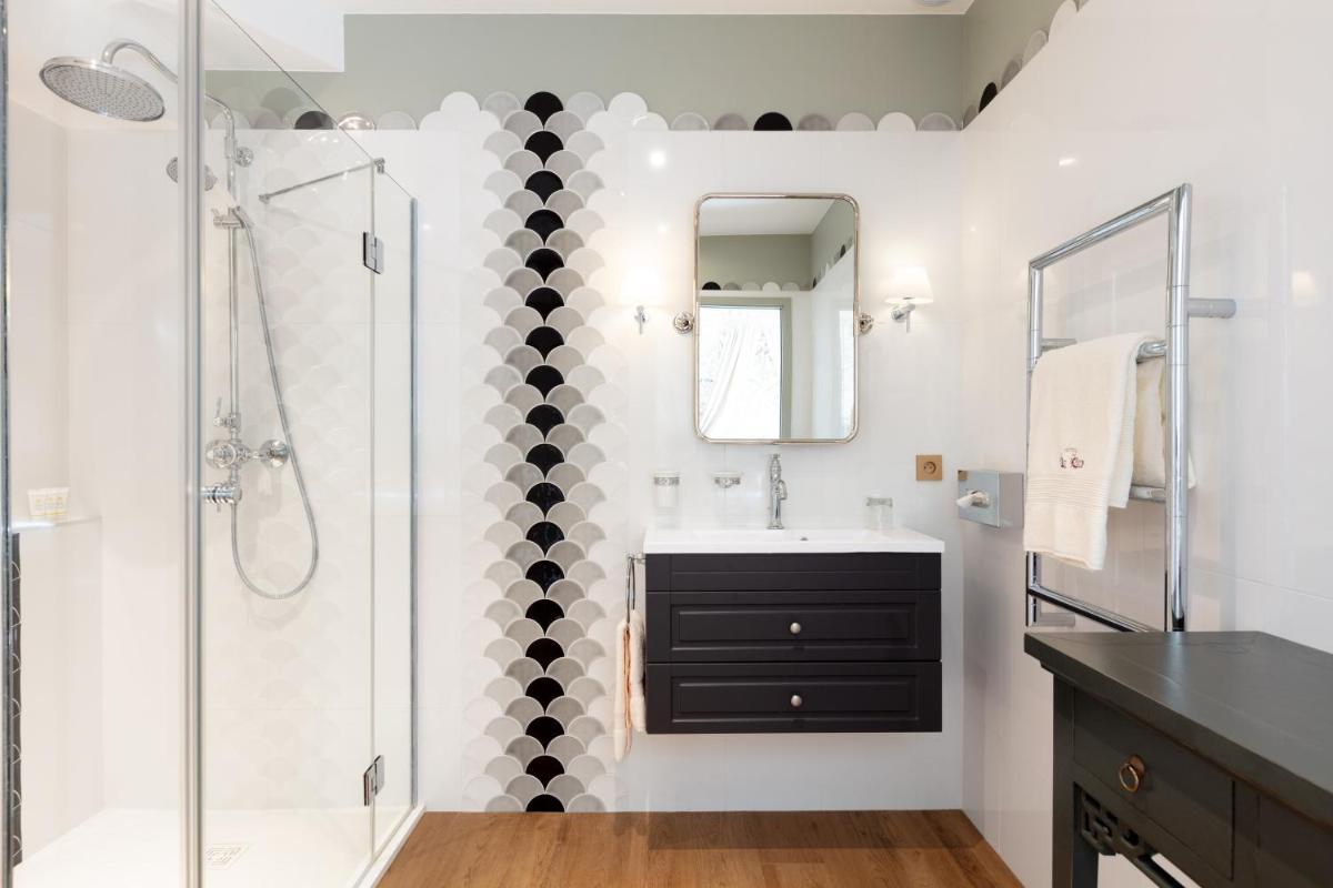 Salle de bains dans l'établissement Hôtel Le Cep & Spa