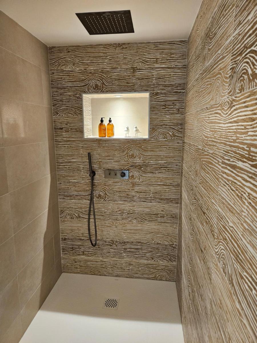 Salle de bains dans l'établissement Le Belvédère Hotel et Bien être