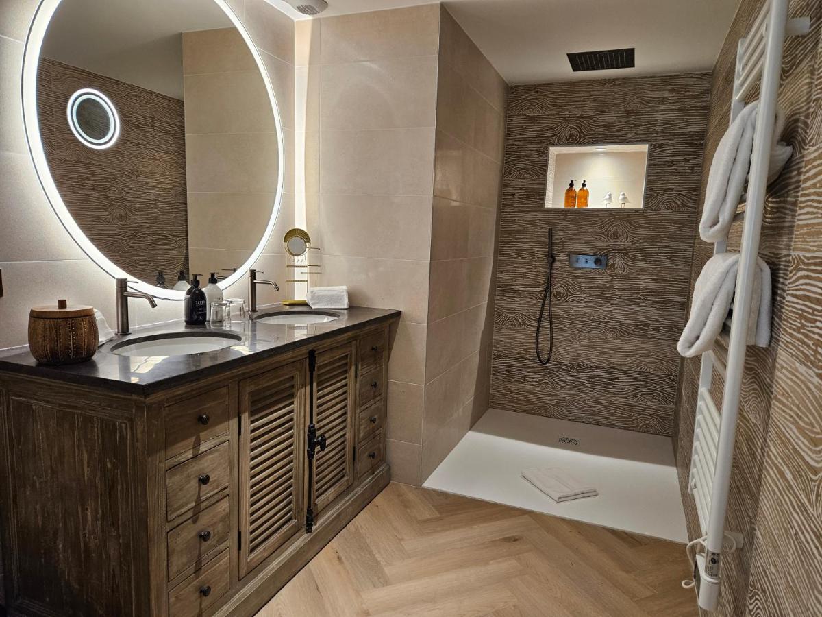 Salle de bains dans l'établissement Le Belvédère Hotel et Bien être