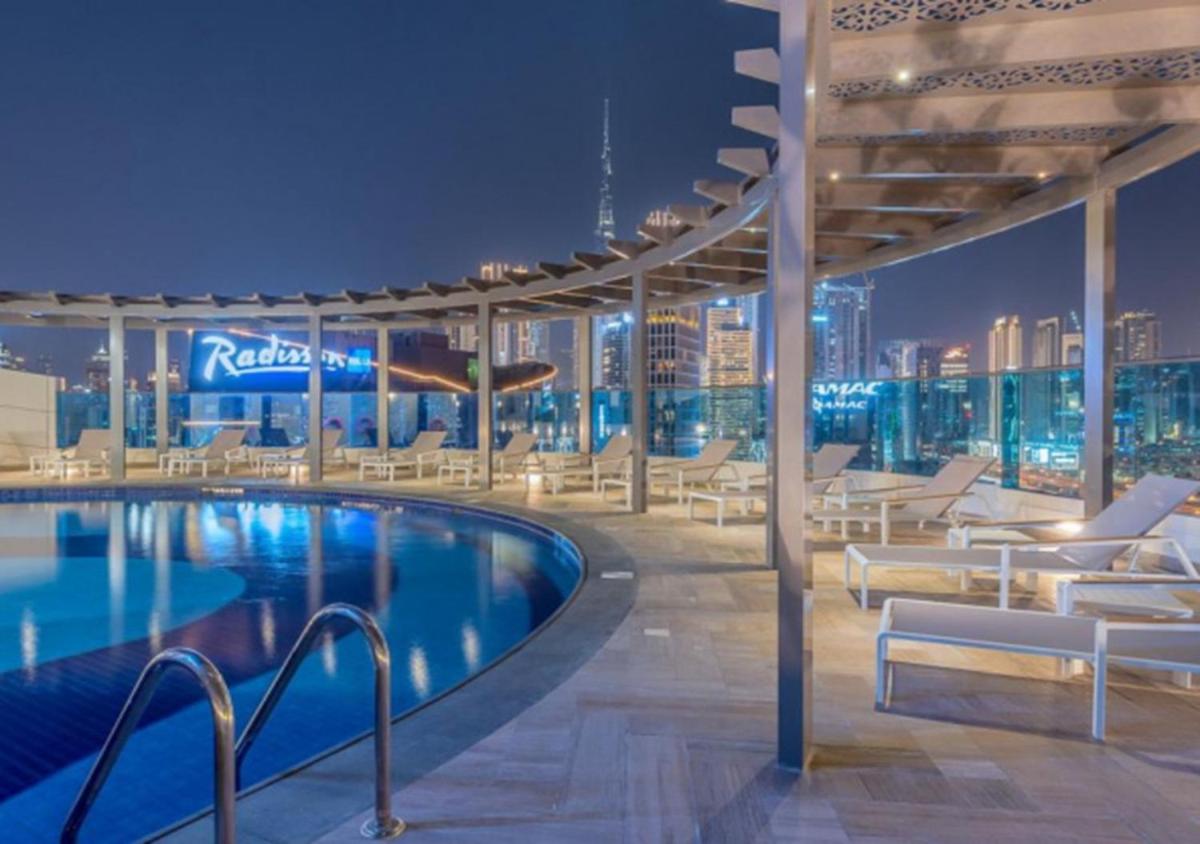Elegant 2BR view with rooftop pool The Bay - Housity