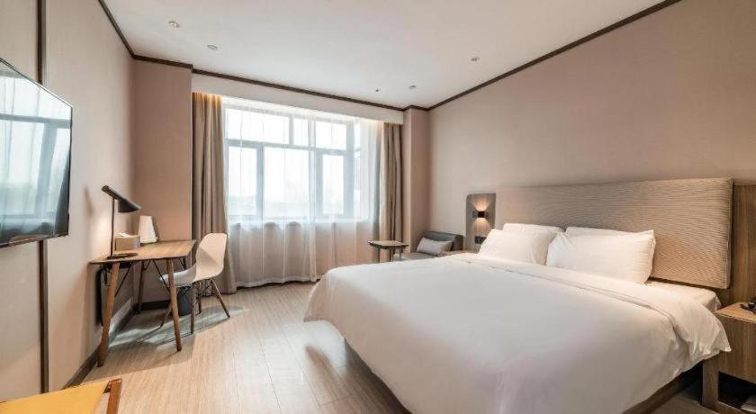 Hanting Hotel Kuitun Sanyang Plaza - Housity