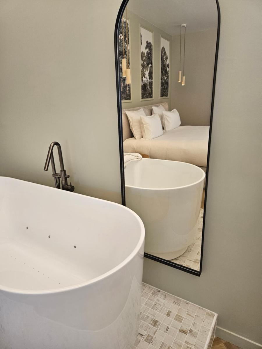 Salle de bains dans l'établissement Le Belvédère Hotel et Bien être