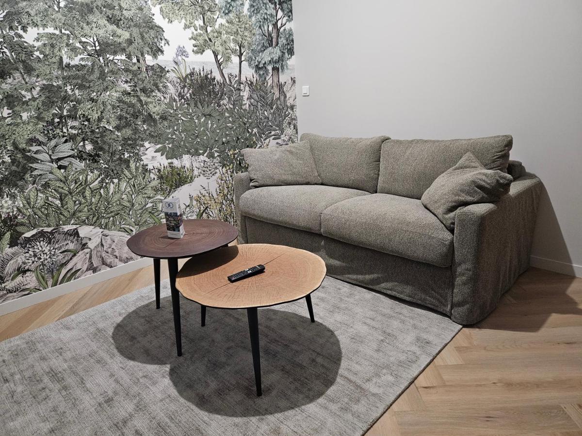 Coin salon dans l'établissement Le Belvédère Hotel et Bien être