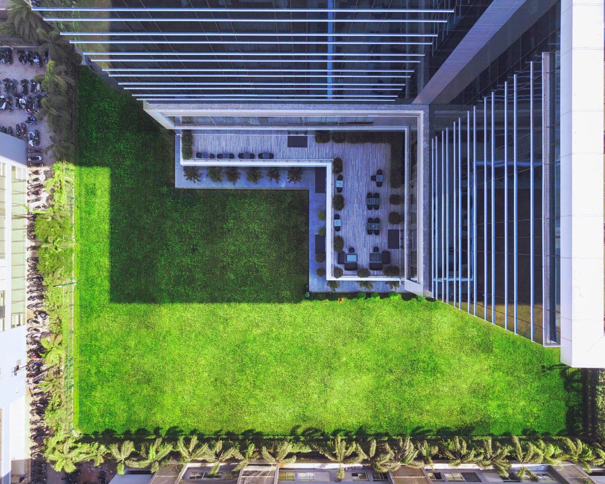an overhead view of a building with a green roof at Renaissance Ahmedabad Hotel in Ahmedabad
