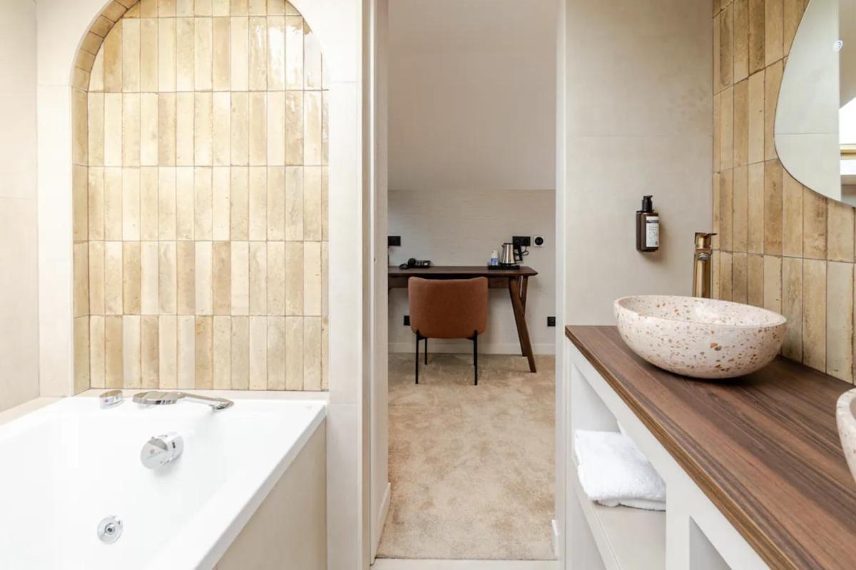 Salle de bains dans l'établissement Atypik Hotel