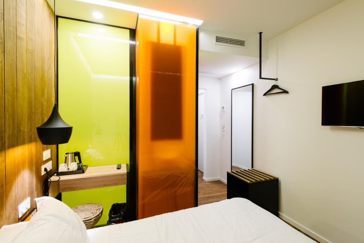 Un ou plusieurs lits dans un hébergement de l'établissement Atypik Hotel