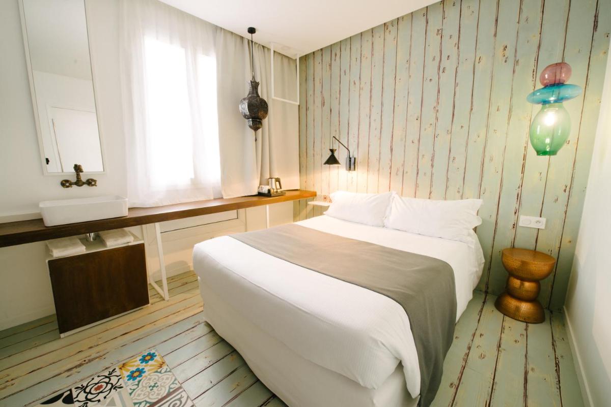 Un ou plusieurs lits dans un hébergement de l'établissement Atypik Hotel