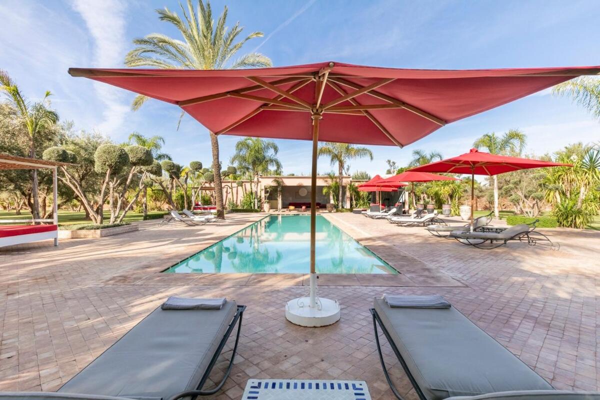 Villa Koutoubia, jardin luxuriant, piscine et spa - Housity
