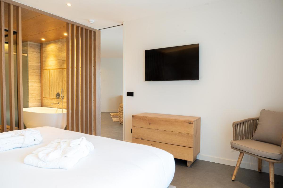 Uma televisão e/ou sistema de entretenimento em AP Cabanas Beach & Nature - Adults Friendly