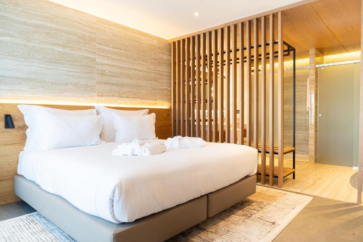 Uma cama ou camas num quarto em AP Cabanas Beach & Nature - Adults Friendly