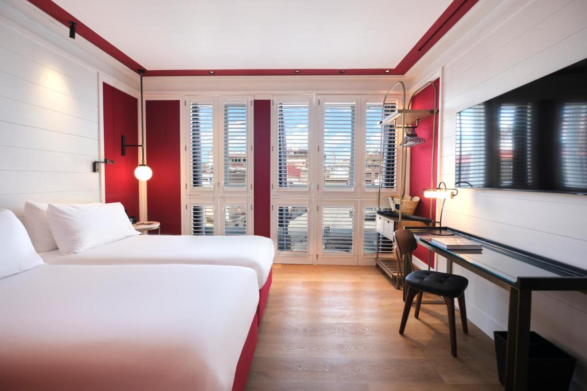 Cama o camas de una habitación en ESTIMAR Valencia