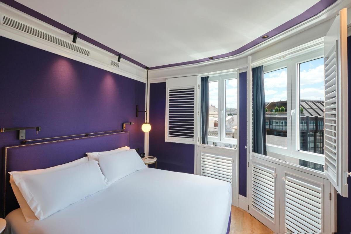 Cama o camas de una habitación en ESTIMAR Valencia