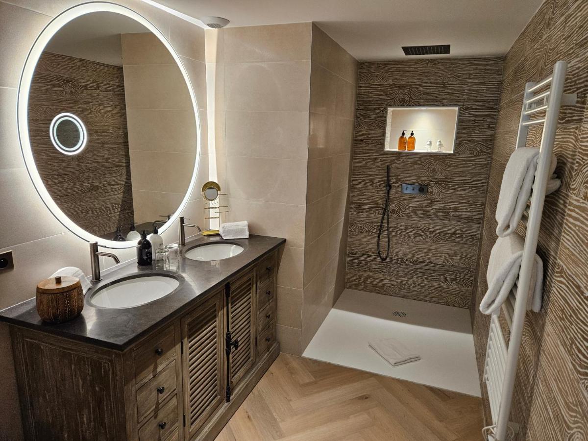 Salle de bains dans l'établissement Le Belvédère Hotel et Bien être