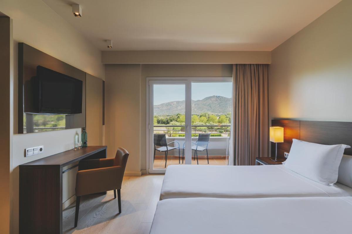 Cama o camas de una habitación en Hotel Spa Mediterraneo Park